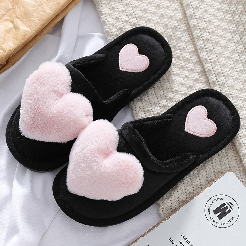 Cute slippers with a fluffy heart