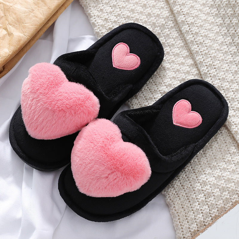 Cute slippers with a fluffy heart