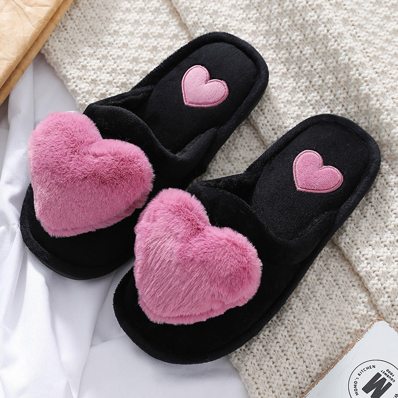 Cute slippers with a fluffy heart