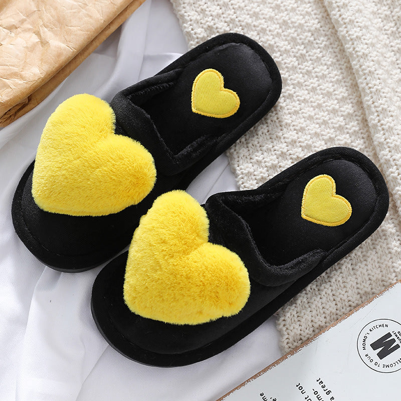 Cute slippers with a fluffy heart