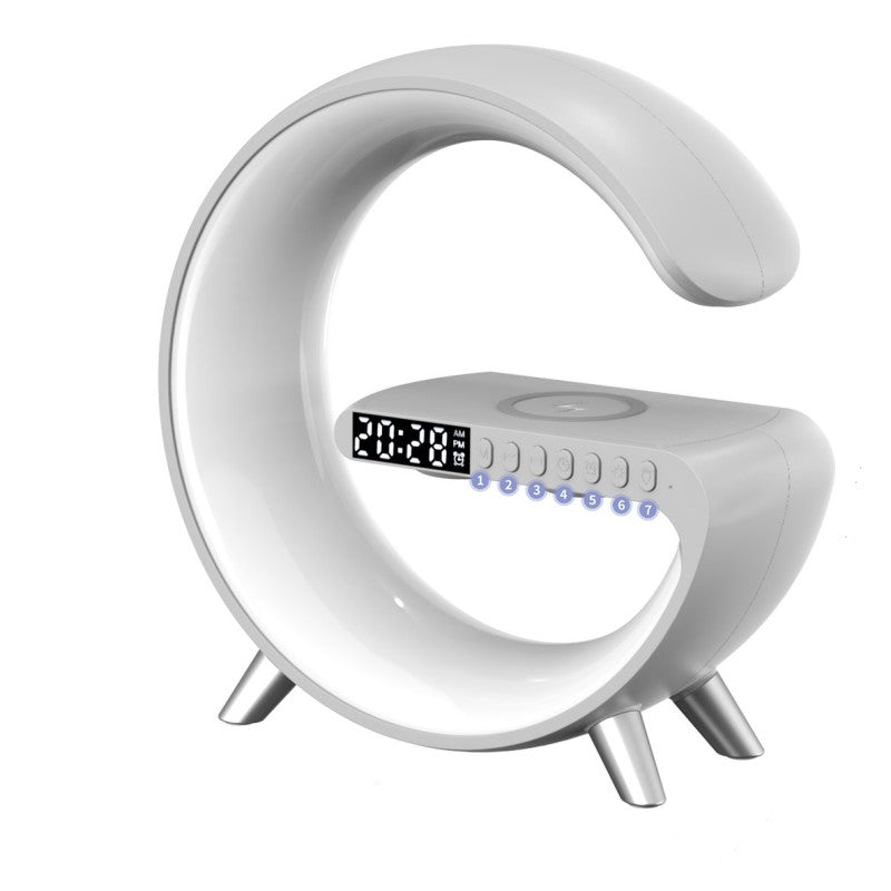 Multifunctional charging station with alarm clock, speaker and RGB light